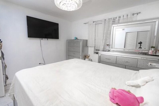 4222 Trucious Pl Unit 4222, New Port Richey, FL 34652 - bedroom with a chandelier