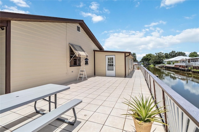 view of patio / terrace with a water view