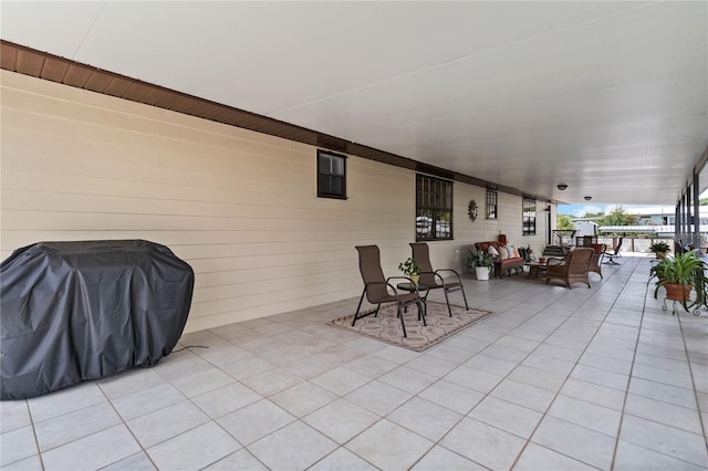 view of patio with a grill