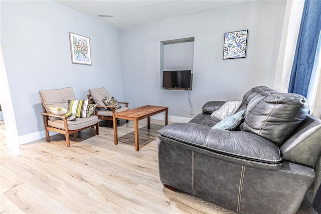 living room featuring light wood-type flooring