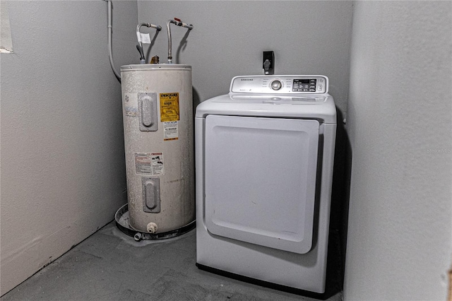 laundry room featuring washer / dryer and electric water heater