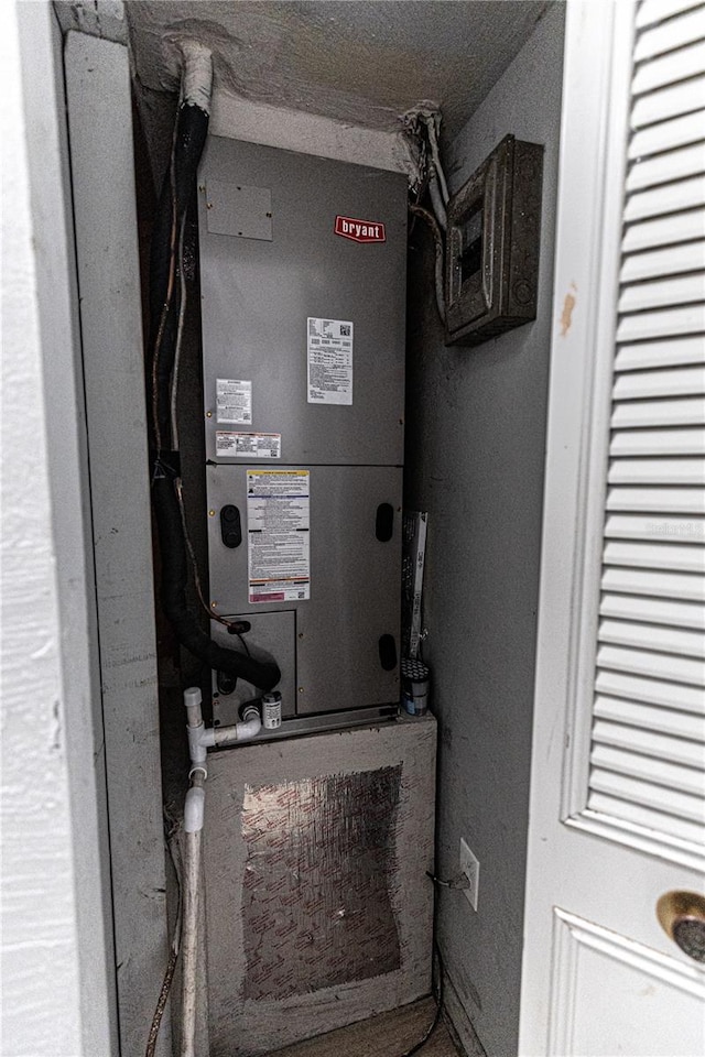 utility room with heating unit