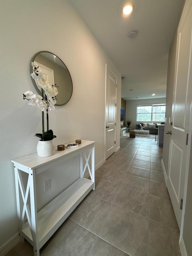 corridor featuring tile patterned floors