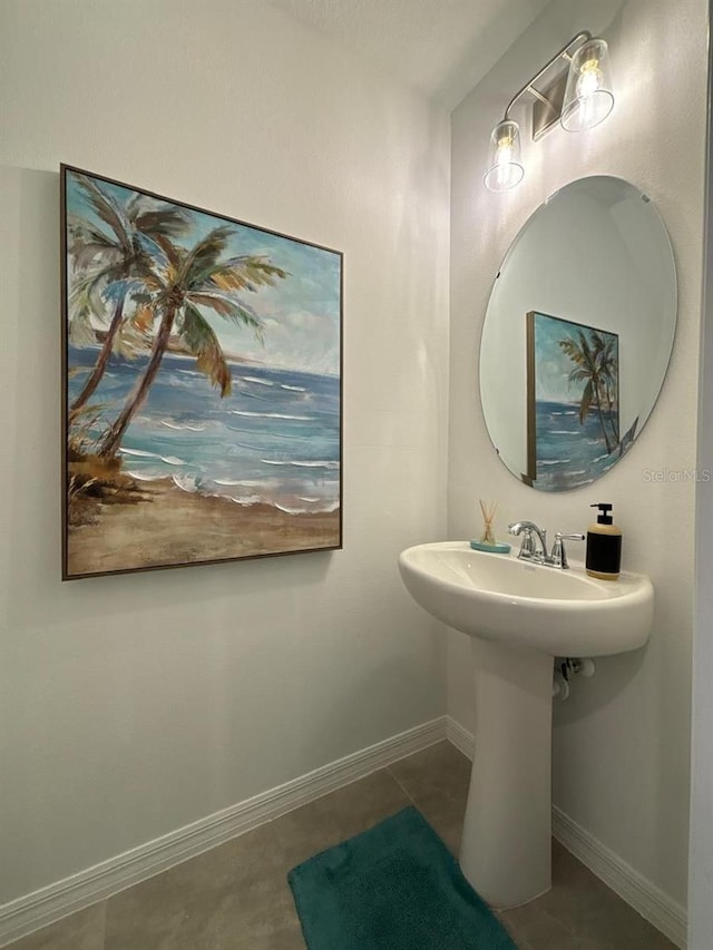 bathroom with tile patterned flooring