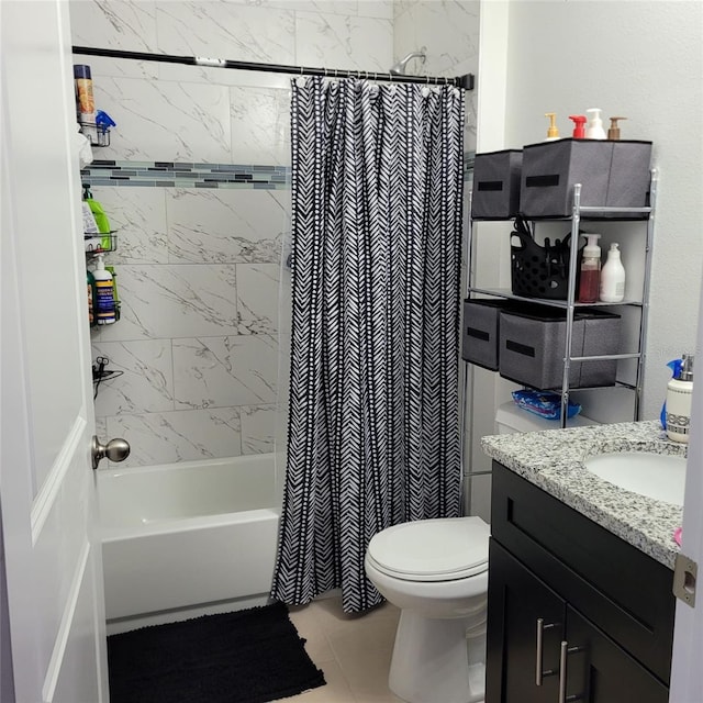 full bathroom featuring tile patterned floors, shower / bath combo, toilet, and vanity