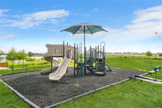 view of jungle gym with a lawn