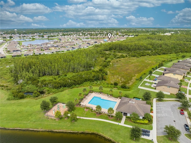 birds eye view of property with a water view