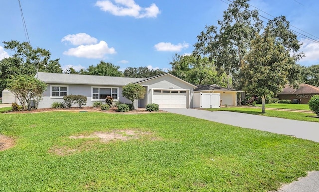 single story home with a garage and a front yard