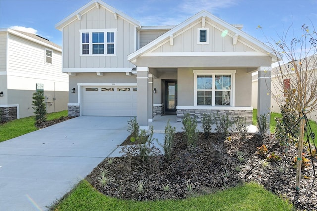 craftsman-style home featuring a porch and a garage