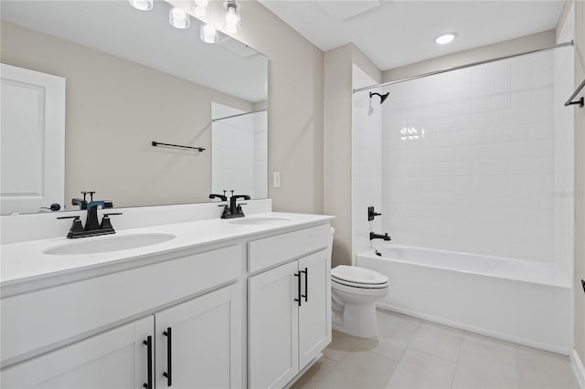 full bathroom with tile patterned floors, vanity, toilet, and shower / bath combination