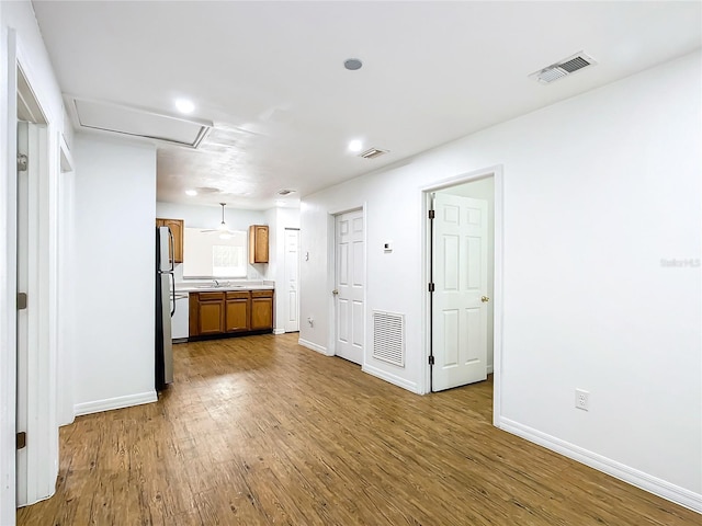 kitchen featuring sink and hardwood / wood-style flooring