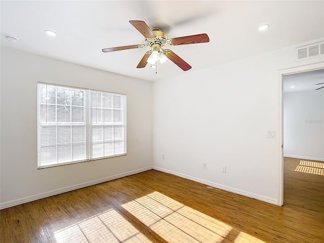 unfurnished room featuring ceiling fan and light hardwood / wood-style floors