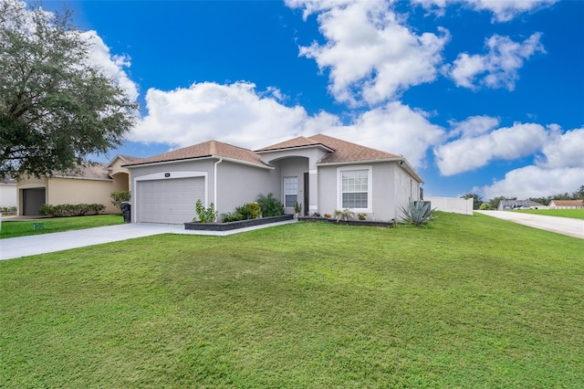 view of front of home with a garage and a front yard