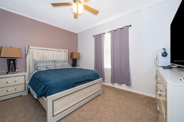 bedroom with ceiling fan and carpet