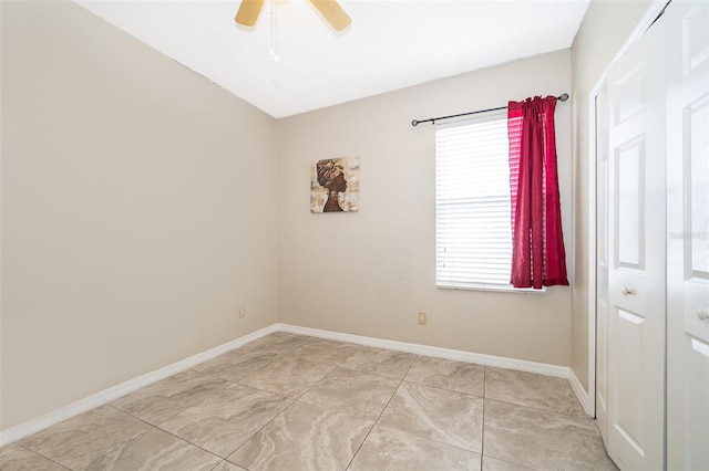 unfurnished room featuring ceiling fan