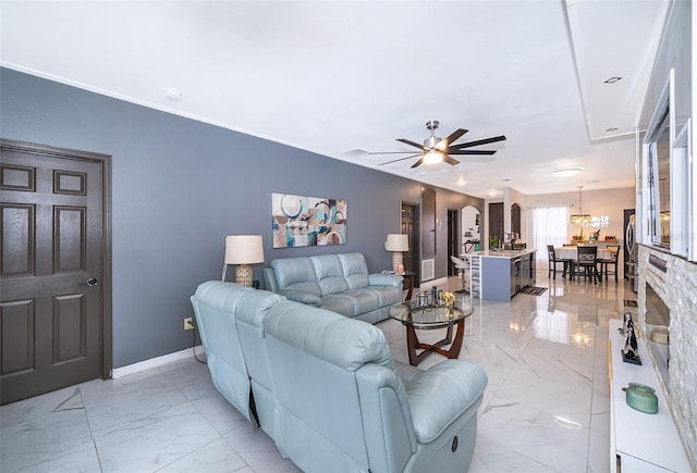 living room featuring ceiling fan