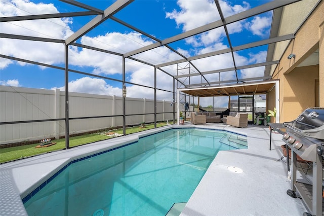 view of swimming pool with area for grilling, a patio, and glass enclosure