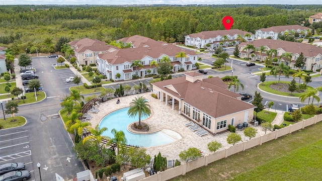 8968 Silver Pl, Kissimmee, FL 34747 - aerial view of residential area with a heavily wooded area and a pool area