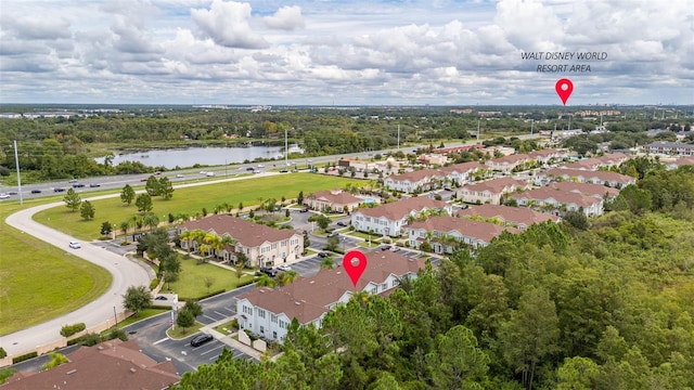 bird's eye view with a water view