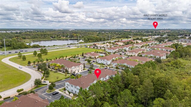 8968 Silver Pl, Kissimmee, FL 34747 - aerial overview of property's location with a large body of water