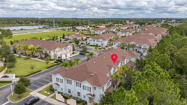 8968 Silver Pl, Kissimmee, FL 34747 - aerial view of residential area with a large body of water