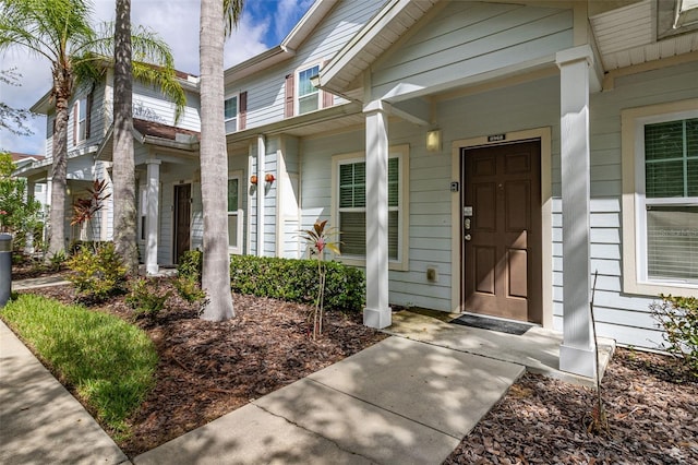 doorway to property featuring a porch