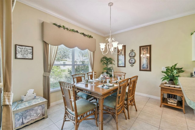 tiled dining space featuring ornamental molding and an inviting chandelier