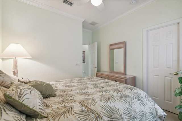 bedroom with ornamental molding and ceiling fan