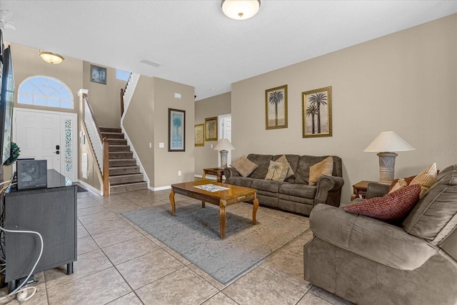 living room with light tile patterned floors