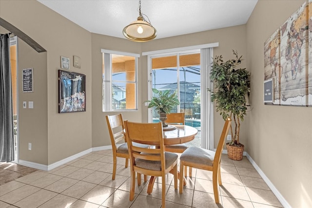 dining room featuring light tile patterned flooring