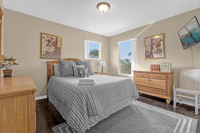 bedroom featuring dark hardwood / wood-style floors