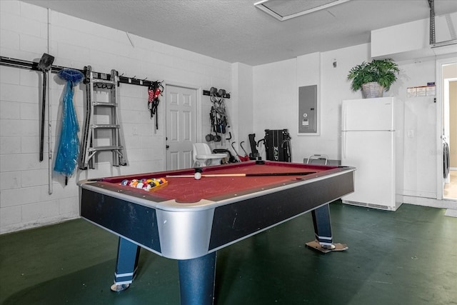 playroom featuring pool table, a textured ceiling, and electric panel