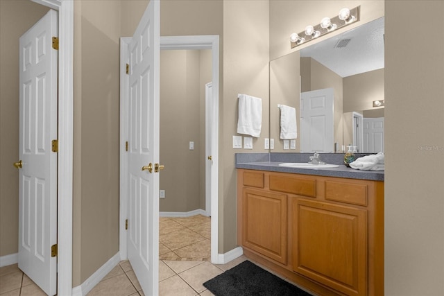 bathroom featuring vanity and tile patterned floors