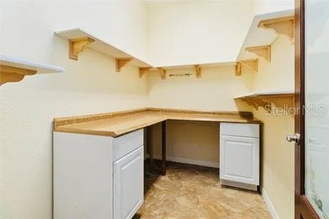 kitchen with white cabinets