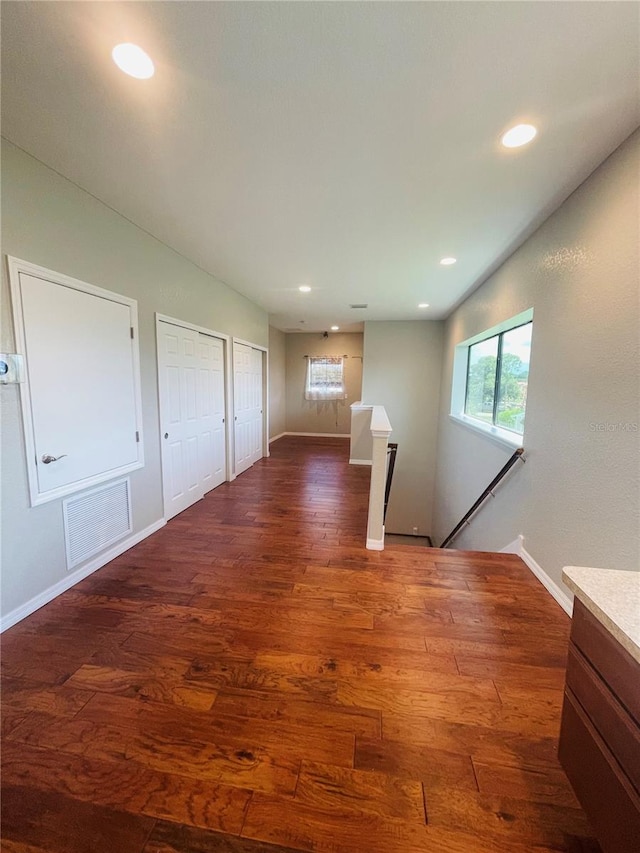 interior space with dark wood-type flooring