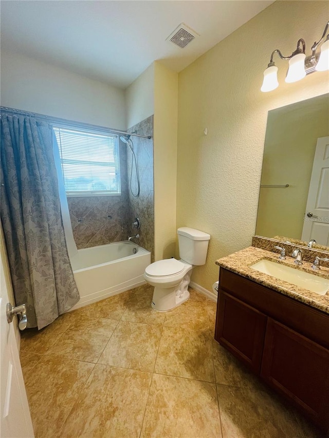 full bathroom with tile patterned flooring, toilet, shower / tub combo, and vanity