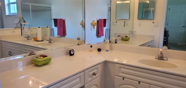 bathroom with double vanity and a sink