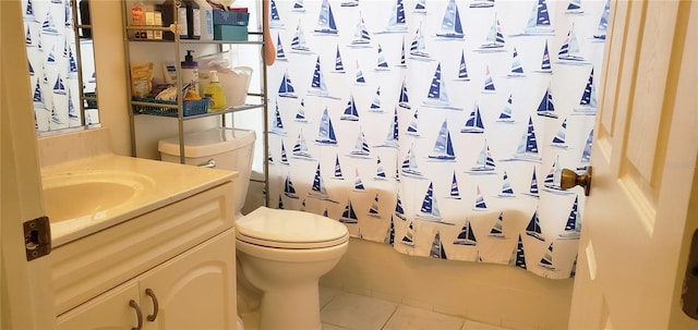 bathroom featuring toilet, tile patterned flooring, vanity, and a shower with shower curtain