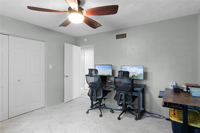 office space featuring ceiling fan