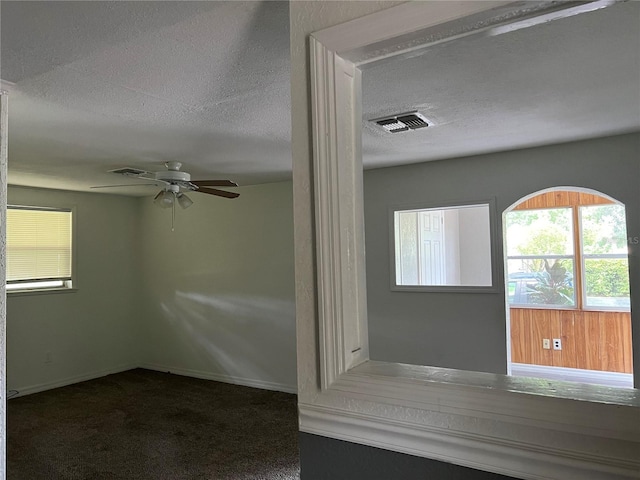6790 Bass Hwy, Saint Cloud, FL 34771 - carpeted empty room featuring ceiling fan, a textured ceiling, and baseboards