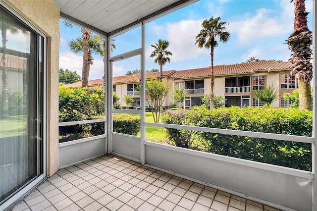 unfurnished sunroom with a wealth of natural light