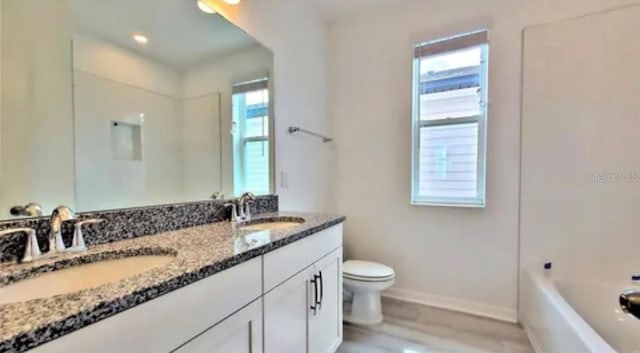 full bathroom with separate shower and tub, toilet, and vanity