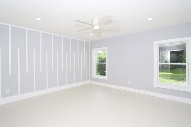 unfurnished room featuring ceiling fan