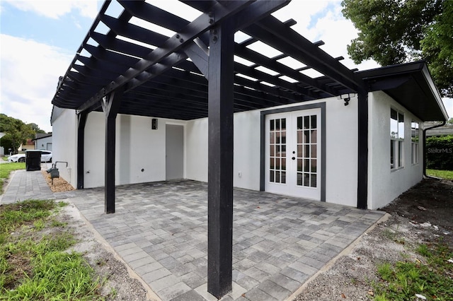 view of patio featuring french doors and a pergola