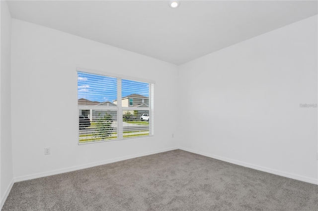 view of carpeted spare room