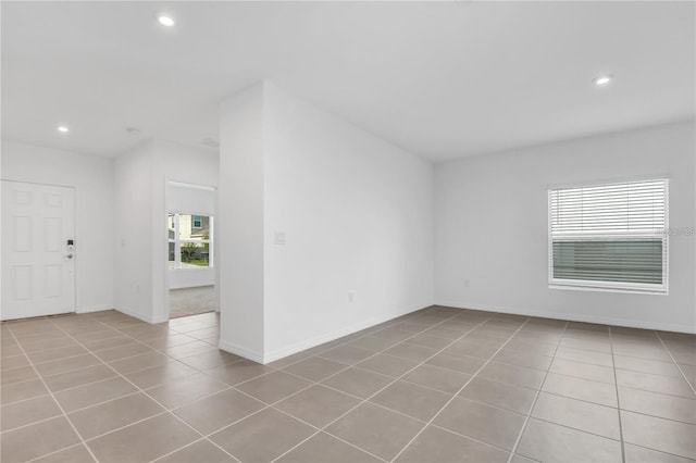 empty room featuring light tile patterned flooring