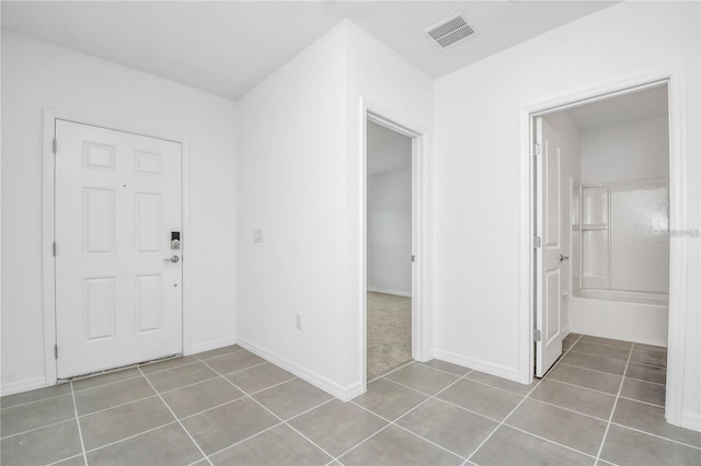 entrance foyer featuring tile patterned floors