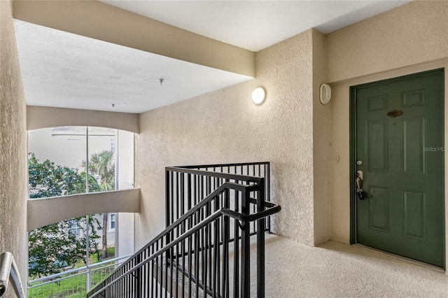 doorway to property featuring a balcony