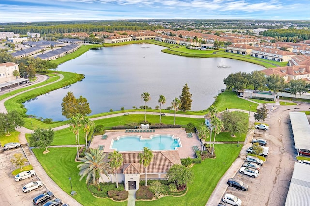 bird's eye view with a water view