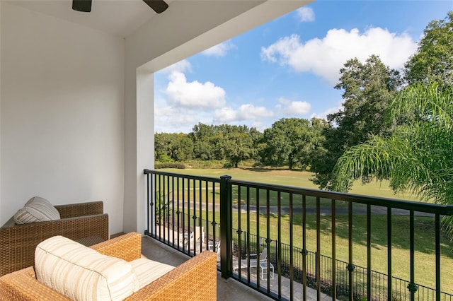 balcony featuring ceiling fan